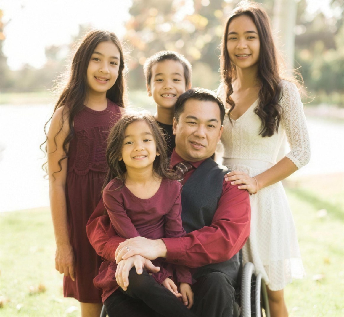 Dr. Bean with his four children in a park, warm afternoon light
